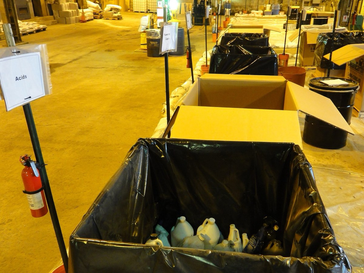 Household hazardous waste sorted into bins at a public collection event (U.S. EPA).