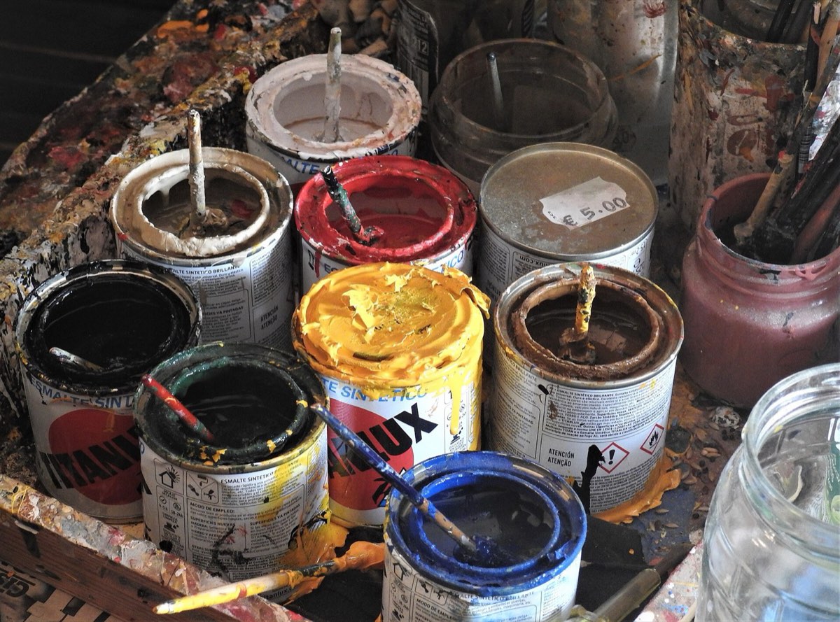 Half-used cans of leftover paint.