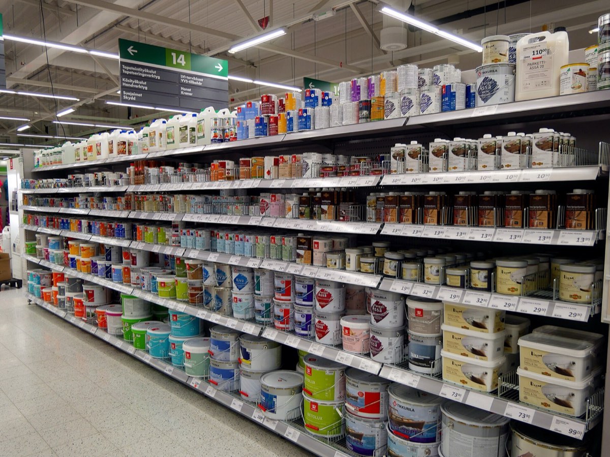 Paint cans on store shelves.